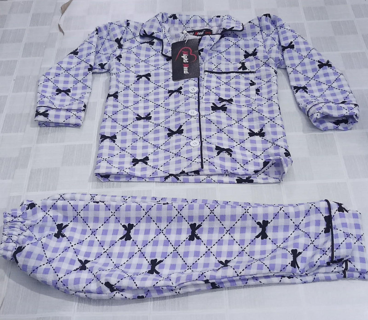 Kids Purple & Black Bow Printed Crinkled Cotton Night Suit